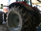 a tractor that is sitting in the dirt