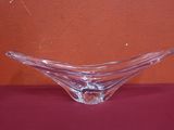 a glass bowl that is sitting on a table