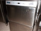 a silver dishwasher sitting in the middle of a kitchen