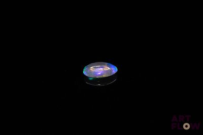 an image of a disc in the dark with a black background