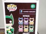 a box with a batman figure on top of it