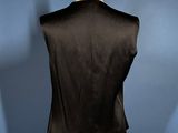 the back of a black vest on a mannequin mannequin mannequin mannequin mann