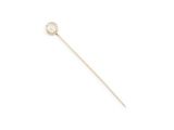 a close up of a metal pin with a white dot on it