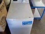 an image of a washing machine in a garage