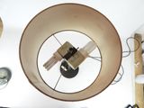 an overhead view of a light fixture with a clock on it
