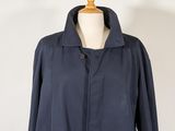 a woman ' s blue jacket on a mannequin mannequin mannequin mannequin mannequin mannequin mannequin mannequin