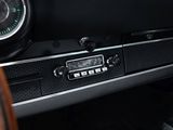 a clock on the dashboard of a car that is in a car