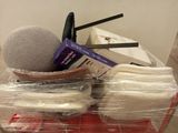 a pile of assorted items sitting on a table