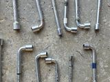 a lot of tools that are laying out on the floor