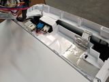 a box with a computer inside of it sitting on a pallet