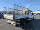 a white truck that is parked in a parking lot