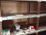 a shelf with many items on it in a store
