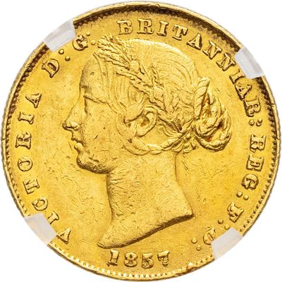 a close up of a gold coin on a white background