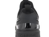 a close up view of a pair of black shoes with black soles
