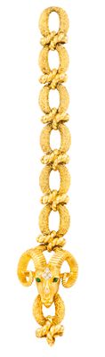 une photo en gros plan d'un bracelet en or serti d'un diamant