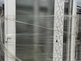a picture of a door that is wrapped in plastic