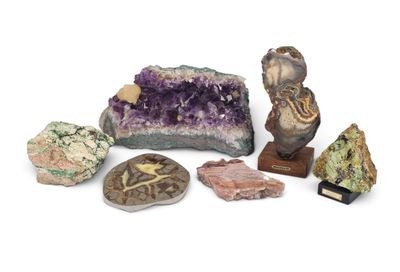 several different types of rocks and stones on a white surface
