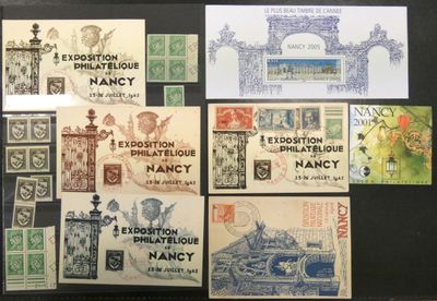 Plusieurs timbres différents sont exposés sur un fond noir.