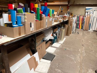 many boxes on the shelves in the room