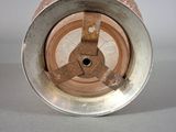 a metal object that is sitting on a table