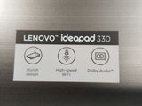 a sign that says lenovo ideapad 3 0 on the side of a refrigerator