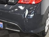 a picture of a car with a denting dent on it