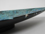 a close up of a bowl with a blue design on it