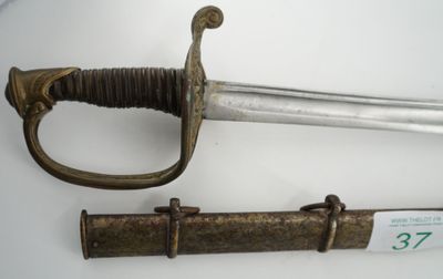 a sword and a dagger on display on a table