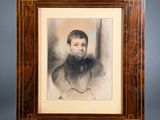 an old photo of a man in a suit and tie in a wooden frame
