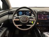 the interior of a car with a steering wheel, dashboard, and other electronics