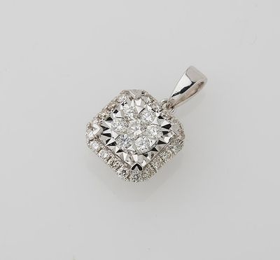a white gold diamond pendant