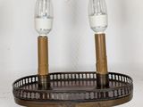 two lamps that are on top of a table