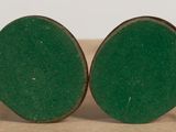 pair of green round wooden earrings with rope on top