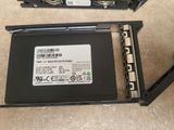 a hard drive attached to a hard drive on the floor