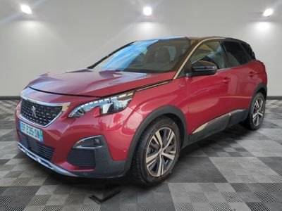a red car parked in a room with a checkered floor