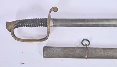 two swords that are laying next to each other on a table