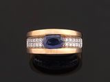 an oval sapphire and diamond ring