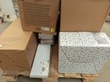 many boxes stacked on top of each other on a pallet