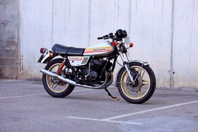 a motorcycle that is parked in a parking lot