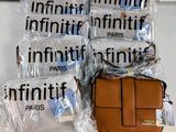 many bags of luggage sitting on a table next to each other
