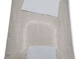 an image of a pillow with a white label on it