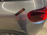 a sticker on the back of a car that has a sticker on it