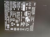 a close up of the back of a black laptop