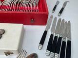 a red box with silverware and silverware in it