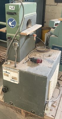a machine that is sitting on a pallet in a building