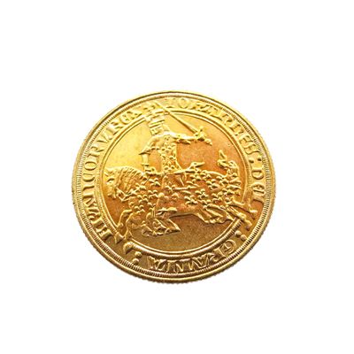 an image of a close up of a gold coin on a white background