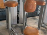 three chairs that are sitting in a gym room