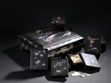 a black box with flowers and butterflies on it
