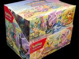 a box of pokemon trading cards on a black background