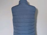 the back of a blue vest on a mannequin mannequin mannequin mannequin mannequin mannequin mannequin mannequin